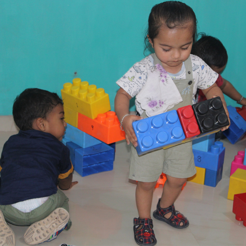 Infant care program - babies receiving personalized attention
